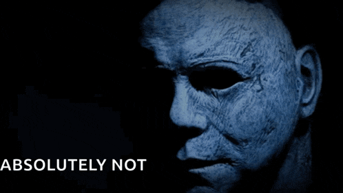 a close up of a man 's face with the words " absolutely not " below it