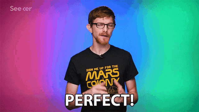 a man wearing a black shirt that says sign me up for the mars colony