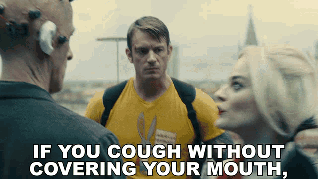 a man in a yellow shirt with the words if you cough without covering your mouth written below him