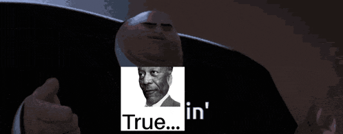 a man in a suit holds a picture of a man with the words true in '