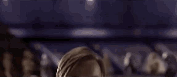 a close up of a man with a beard in a star wars movie