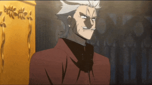 a man with gray hair and a mustache is wearing a red suit