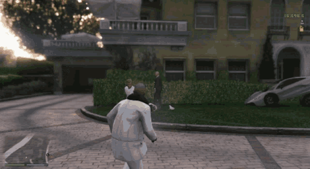 a video game screen shows a car crashing into a building