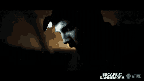 a poster for escape at dannemora shows a man with a light on his head