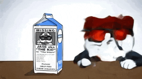 a cartoon cat is sitting next to a carton of missing milk