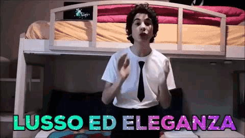 a man wearing a tie and a white shirt with the words lusso ed eleganza on the bottom
