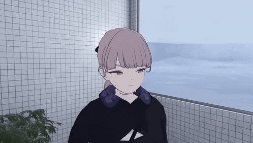 a girl in a black hoodie with the letter a on it looks out a window