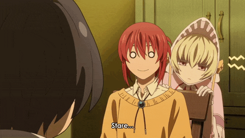 a girl with red hair says stare in front of a man