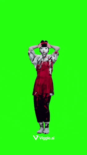 a woman in a red dress is standing on a green screen with her hands behind her head .