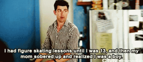 a man in a plaid shirt is standing in front of a refrigerator and talking about his skating lessons