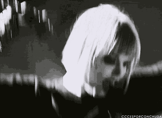 a black and white photo of a woman with the words " cccesporconchuda " on the bottom