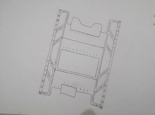 a black and white drawing of a shelf with a few holes in it