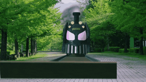 a statue of a train with the word rider on it