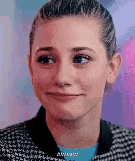 a close up of a woman 's face with a funny face .