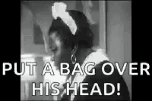 a black and white photo of a maid saying `` put a bag over his head '' .