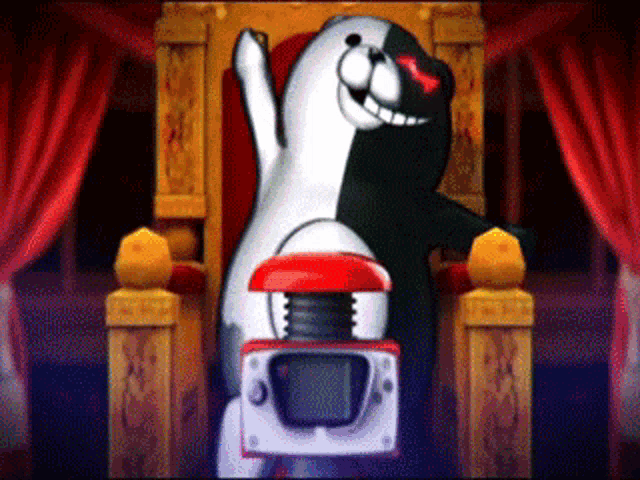 a black and white bear sitting in a chair