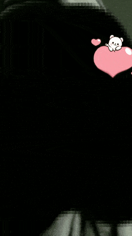 a pixelated image of a woman 's face with a pink heart on it
