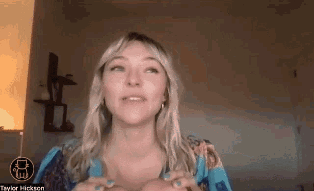 a woman talking on a video call with the name taylor hickson on the bottom
