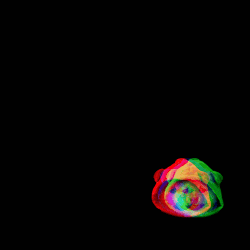 a black background with a rainbow colored object in the middle