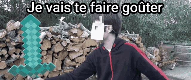 a man holding a sword with the words je vais te faire gouter written above him