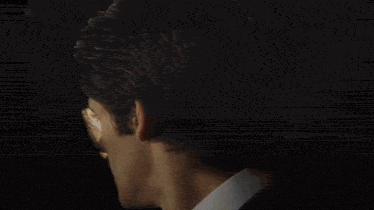 a blurry image of a person standing in a room