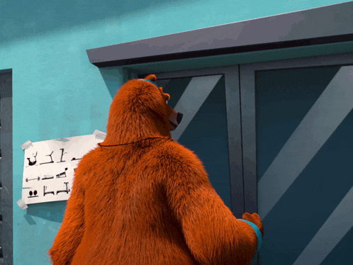 a cartoon bear is standing in front of a sign that says ' i 'm sorry '