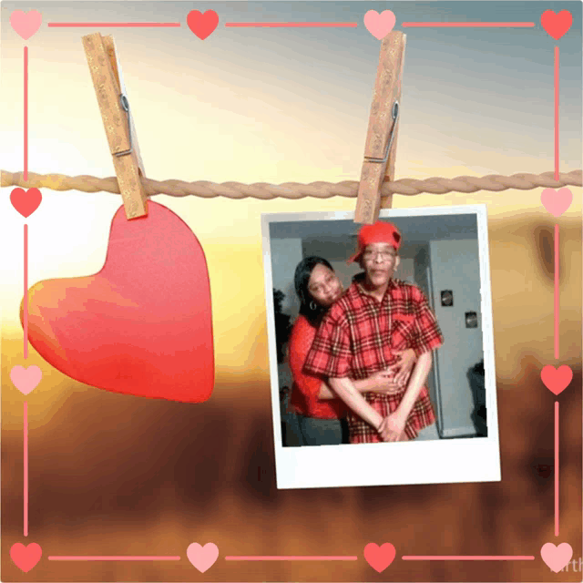 a picture of two people hanging on a clothes line