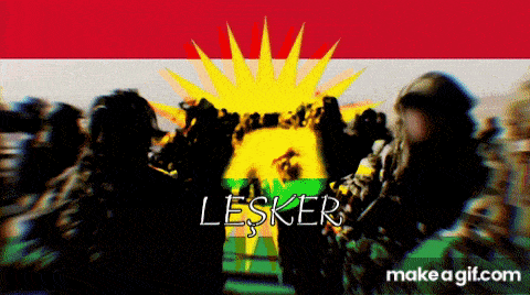 a group of people standing in front of a flag that says lesker on it