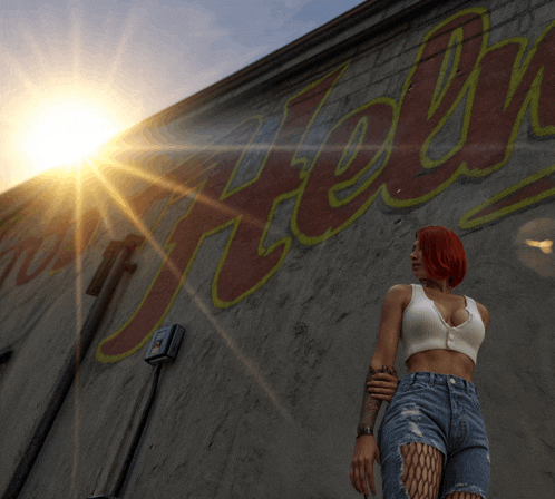 a woman with red hair stands in front of a wall with the word hell written on it
