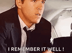 a man in a suit and tie is sitting in a car and says `` i remember it well ! ''