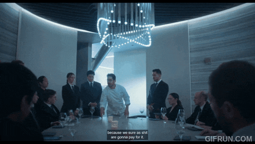 a gif from gifrun.com shows a man in a white shirt