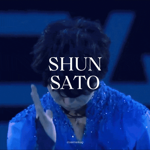 a man is skating on a rink with the name shun sato on the bottom