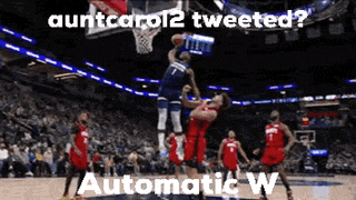 a basketball game is being played with a caption that says auntcarol2 tweeted automatic w