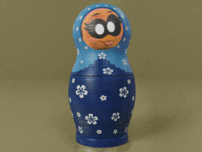 three russian nesting dolls with cartoon faces on them