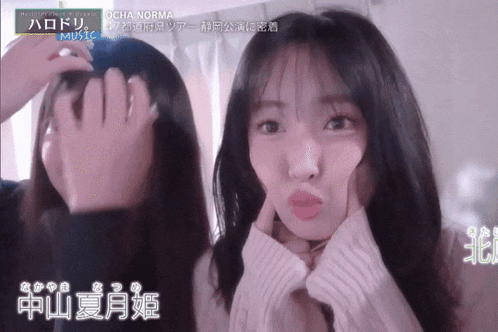 a girl making a funny face with the word ocha norma on the bottom