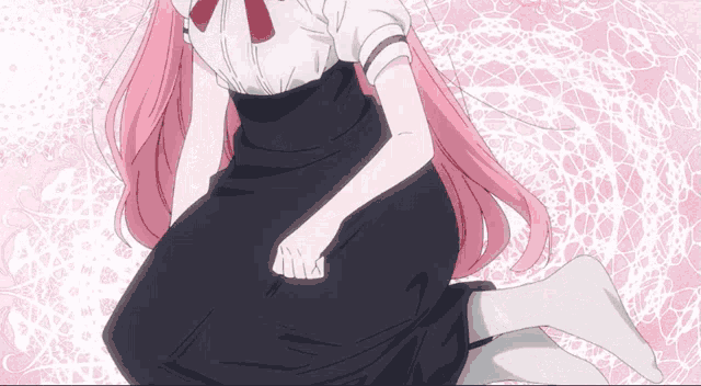 a girl with pink hair and white socks sits on the floor