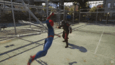 a video game shows spider-man and ant-man fighting each other on a tennis court