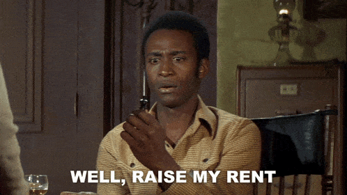 a man says well raise my rent while holding a cigarette
