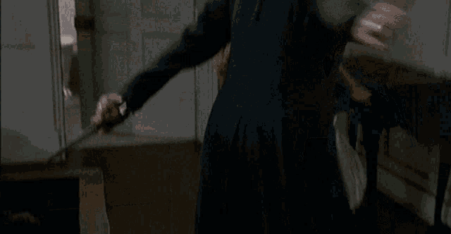 a woman in a white dress is crawling on a rug