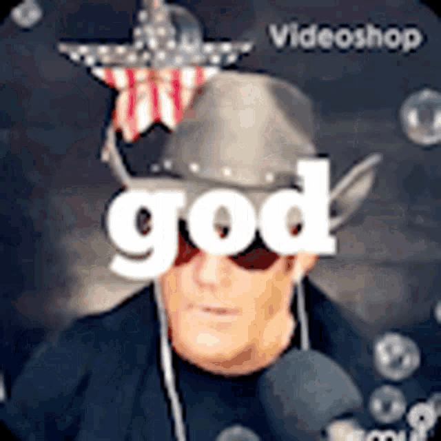 a man wearing a cowboy hat and sunglasses is talking into a microphone with the word god written above him