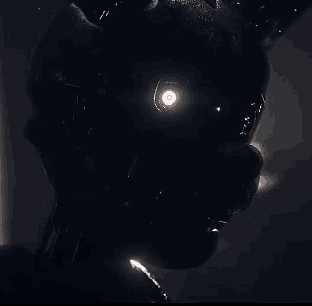 a silhouette of a rabbit with glowing eyes