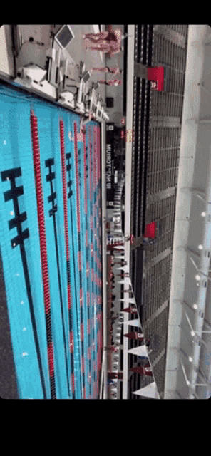 a large swimming pool with a sign that says minuteman on it