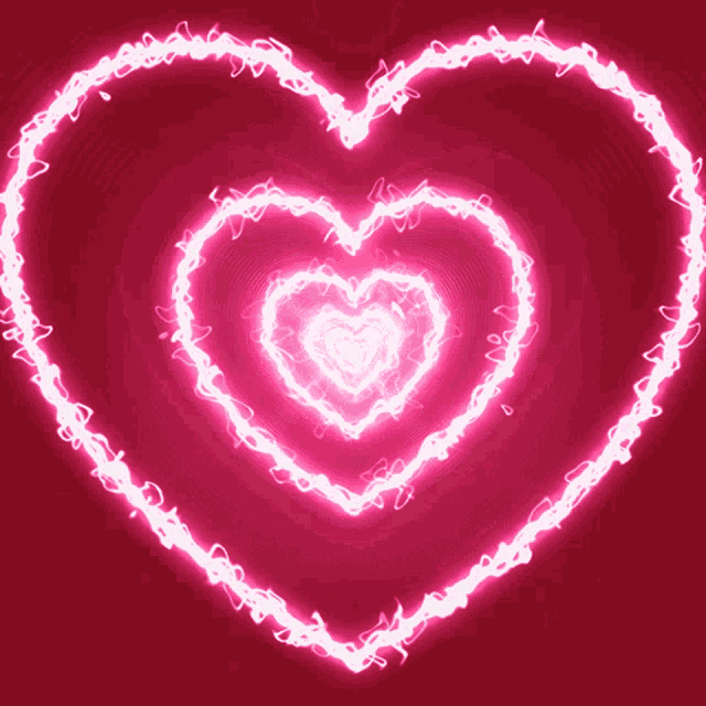 a glowing pink heart on a dark red background