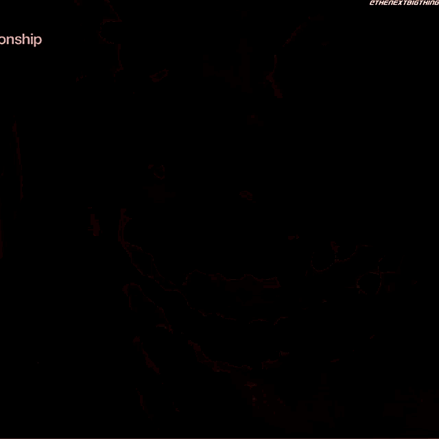 a close up of a clown 's face with the words " the next thing " in the corner