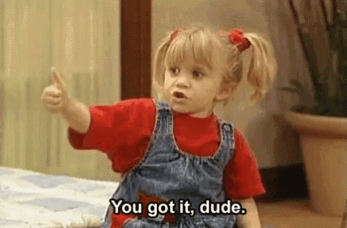 a little girl is giving a thumbs up and saying `` you got it , dude '' .