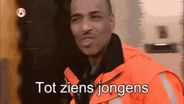 a man in an orange jacket with the words tot ziens jongens on the bottom