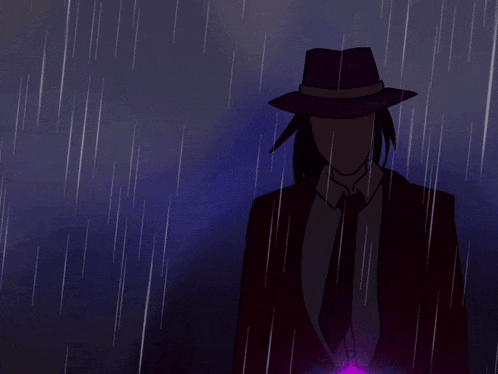 a man wearing a purple hat and a red jacket stands in the rain