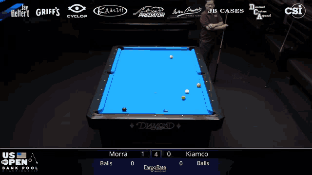 a pool table with a blue cloth and the word diamond on it