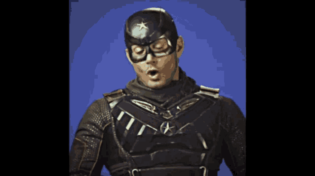 a man in a captain america costume is smiling and says okay