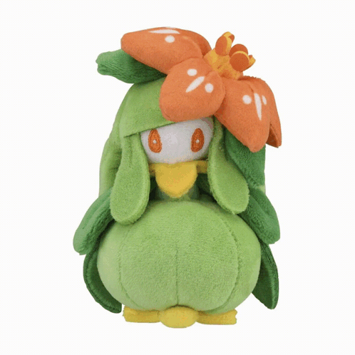 a stuffed animal with green leaves and a flower on its head